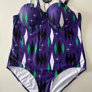 Sourpuss Purple Geometric One-Piece with Green, Black & White Accents